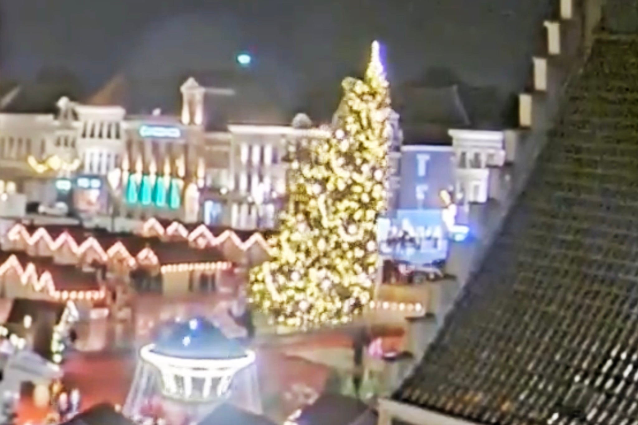 Woman killed and two injured as festive market Christmas tree falls